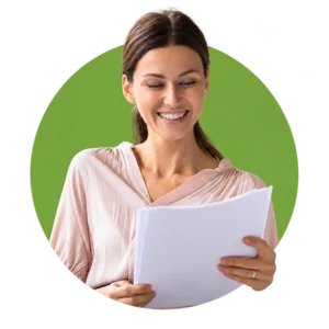 Smiling homeowner holding papers